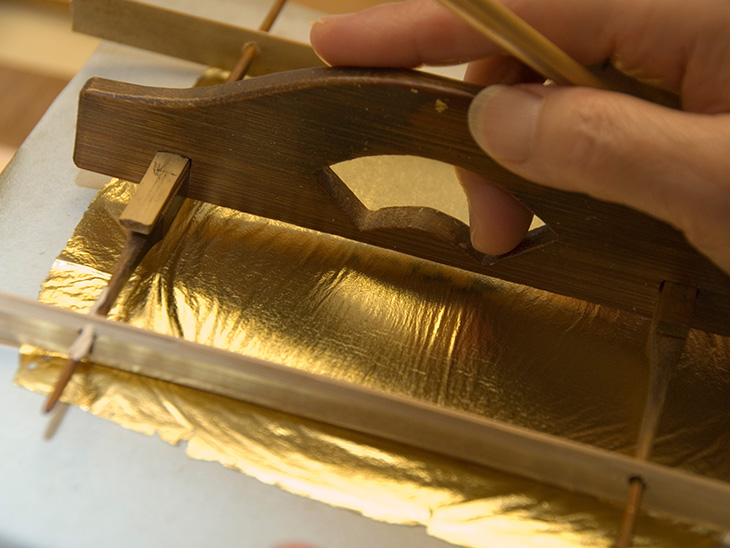 Cutting gold leaf